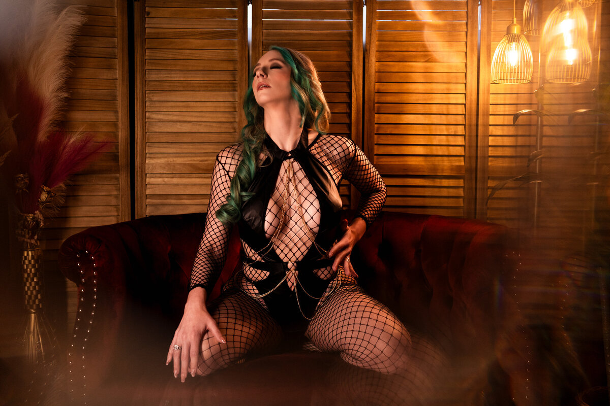 fishnet boudoir outfit and harness with chains