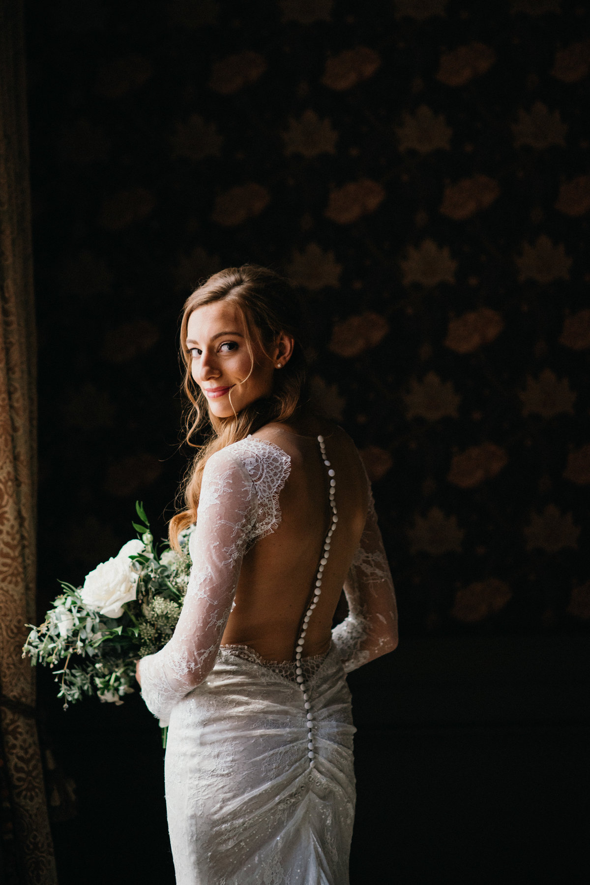 Gorgeous bride in a gorgeous wedding gown, photographed by Sweetwater.