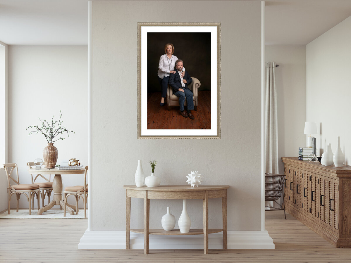 Family Photographer, a fine art photo is hung on wall above wall table
