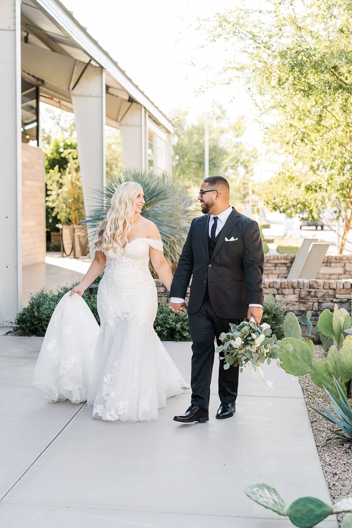 Scottsdale-Wedding-Photographers-The-Clayton-House-Bride-Groom-Walking-1123