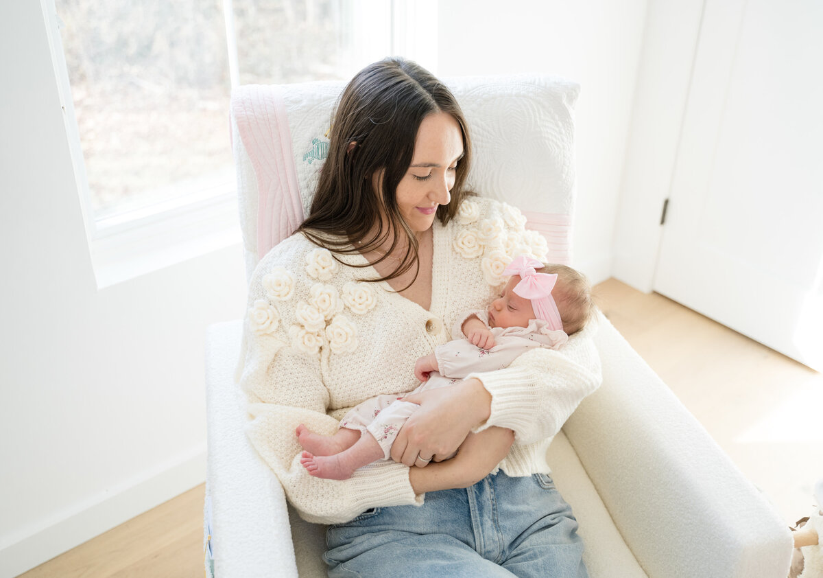 Lifestyle newborn photograph of mother and baby in Fairfield County, CT