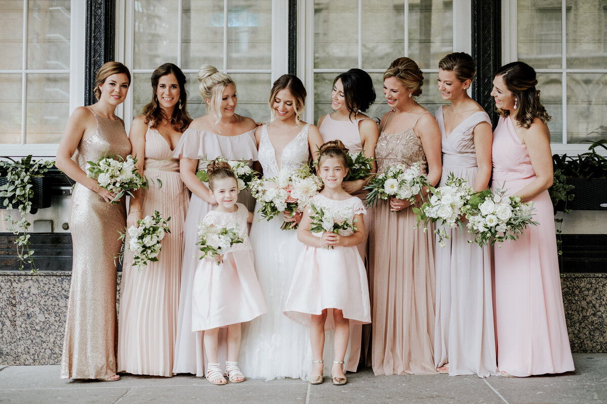 Bridal party at the Willow Inn wearing pale pink dresses, holding lush bouquets.