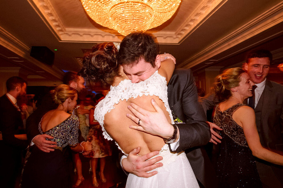90 groom-hugs-bride-castle-wedding