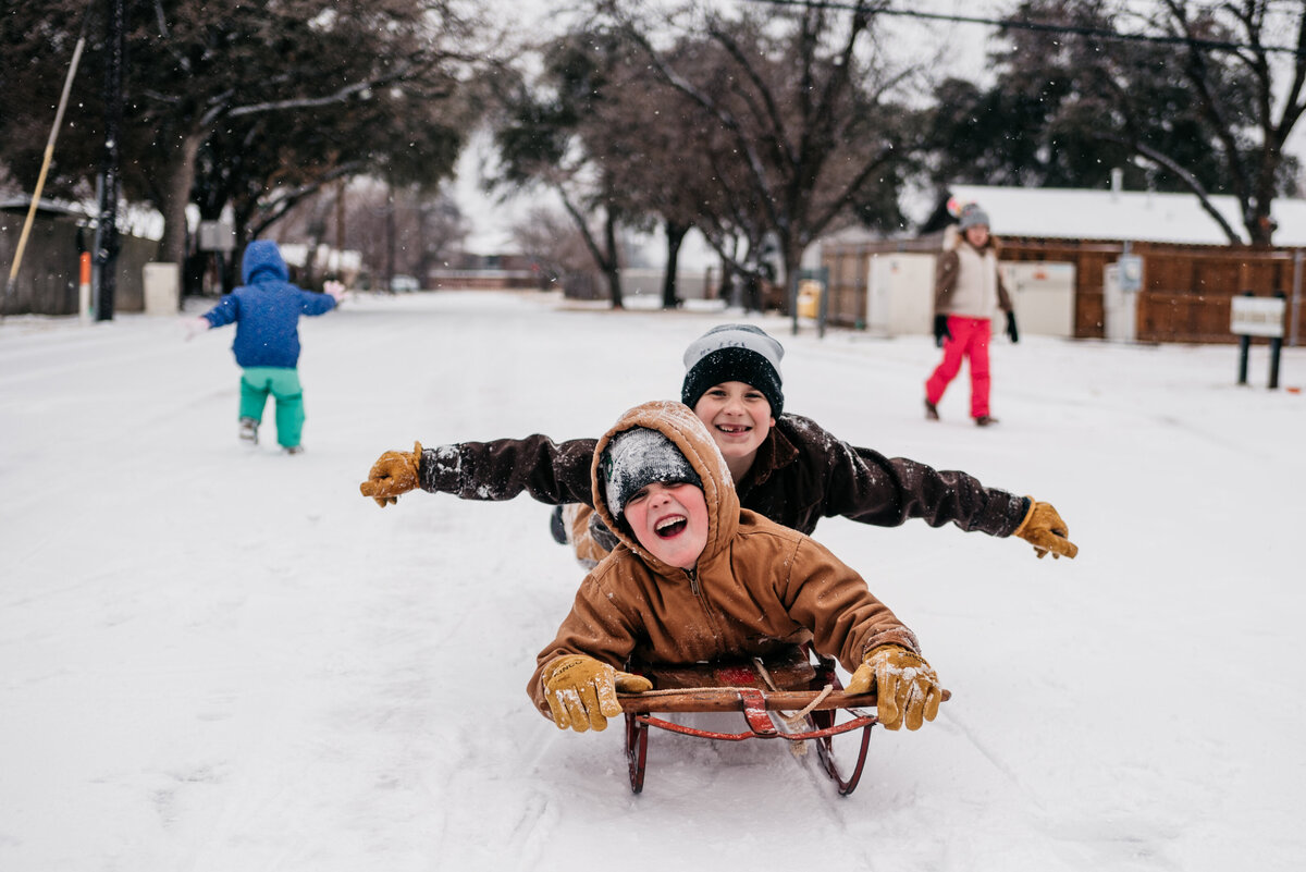 sledding brothers