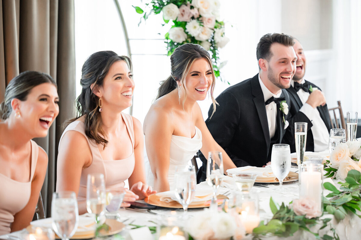 wedding toasts smiling