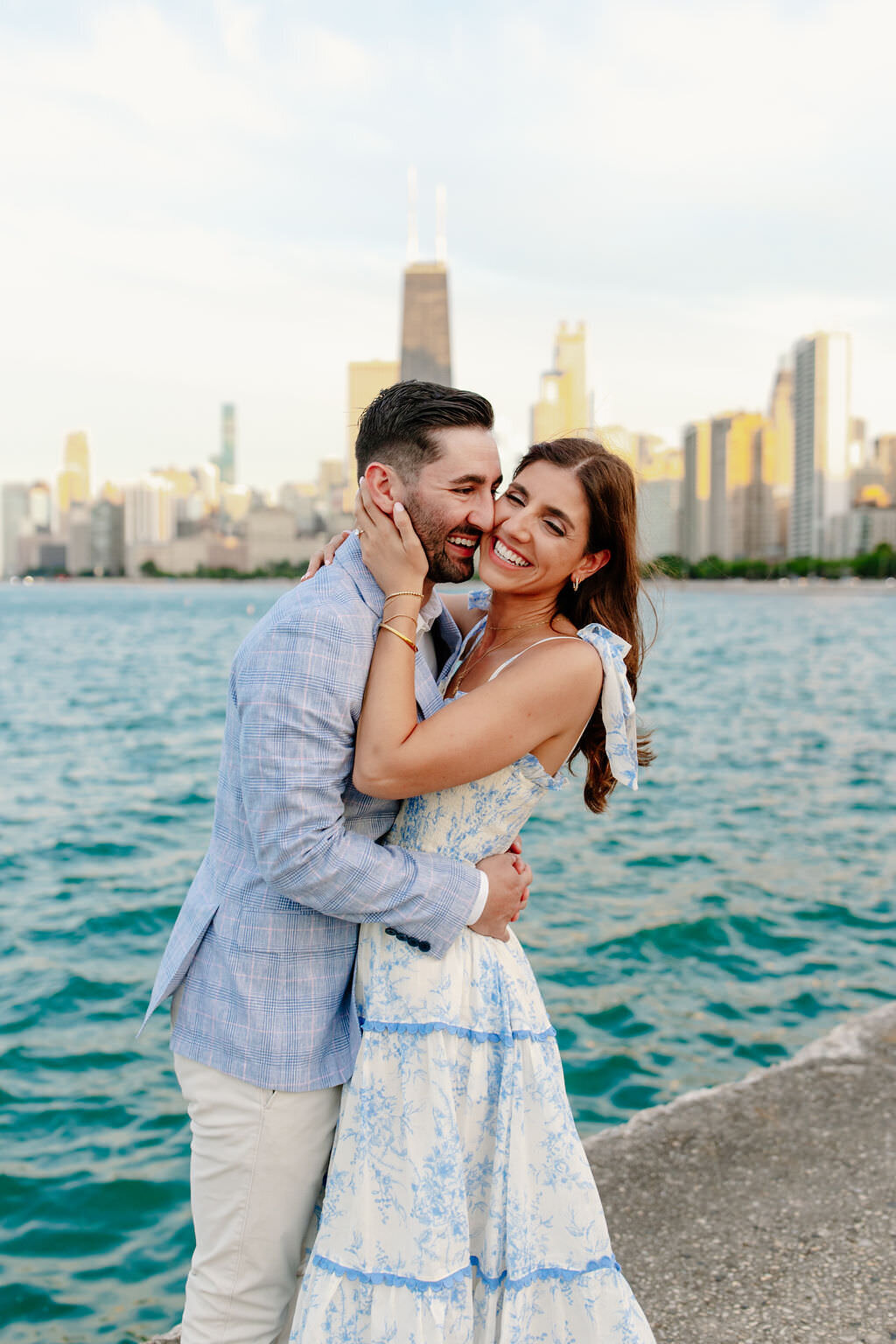 An engagement photography session at The Wrigley Building and North Ave Beach in Chicago, Illinois - 31