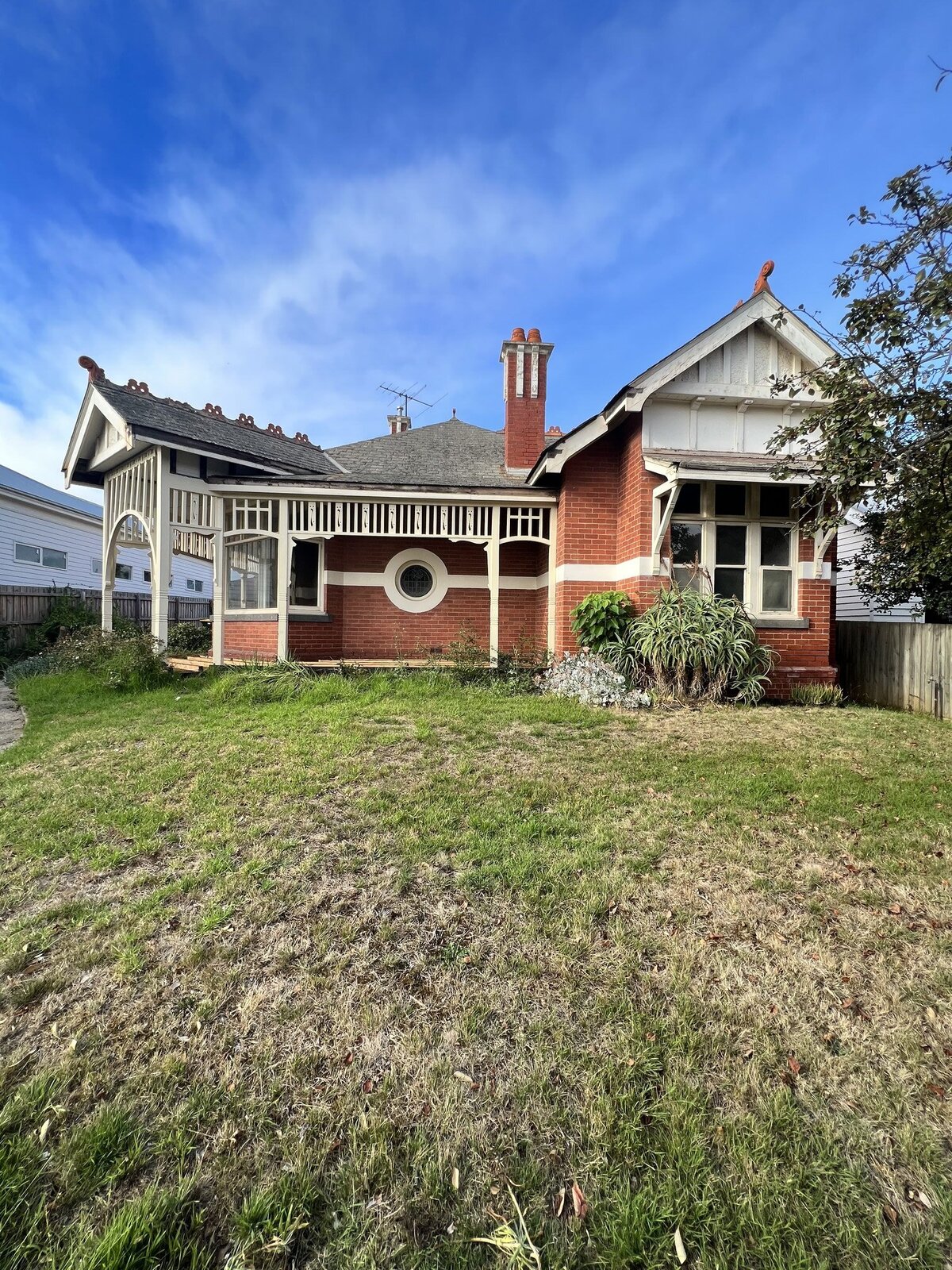 Red brick federation home with beautiful wooden panelling and architraves