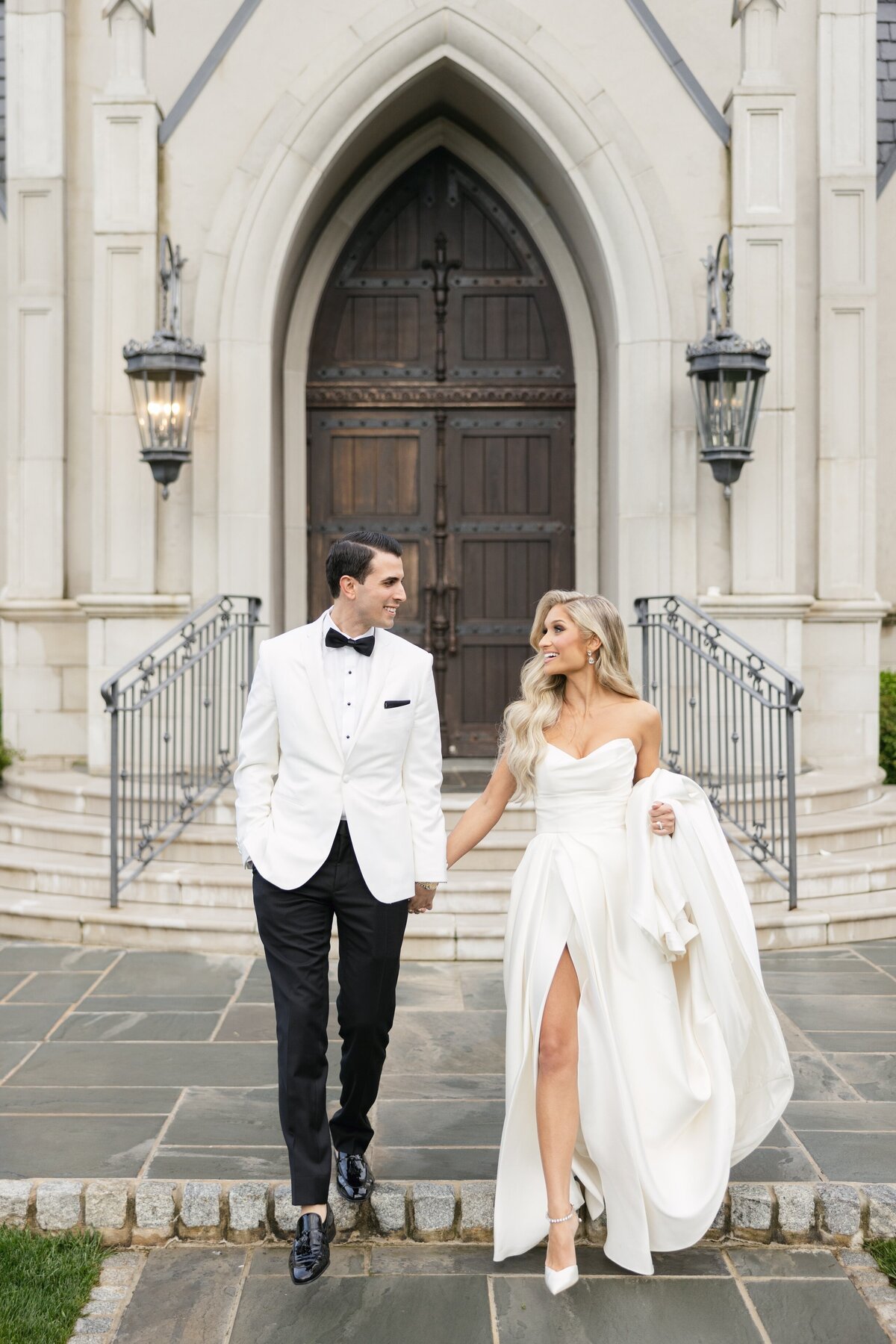Wedding portraits outside Cathedral Basilica of the Sacred Heart in Newark NJ with the bride and groom on the grand stone steps