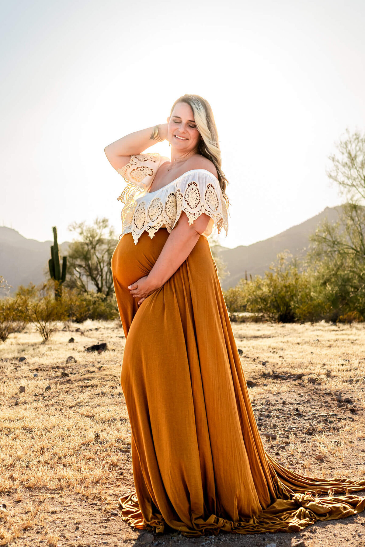 beautiful mom-to-be in boho gown from Cactus & Pine Photography