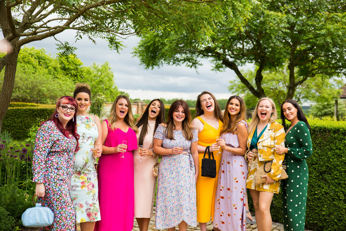 Wedding-Bury-Court-Barn-ladies-laughign-1