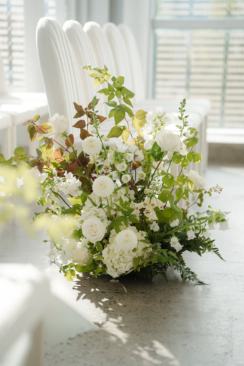 classic-white-floral-wedding-aisle-science-center