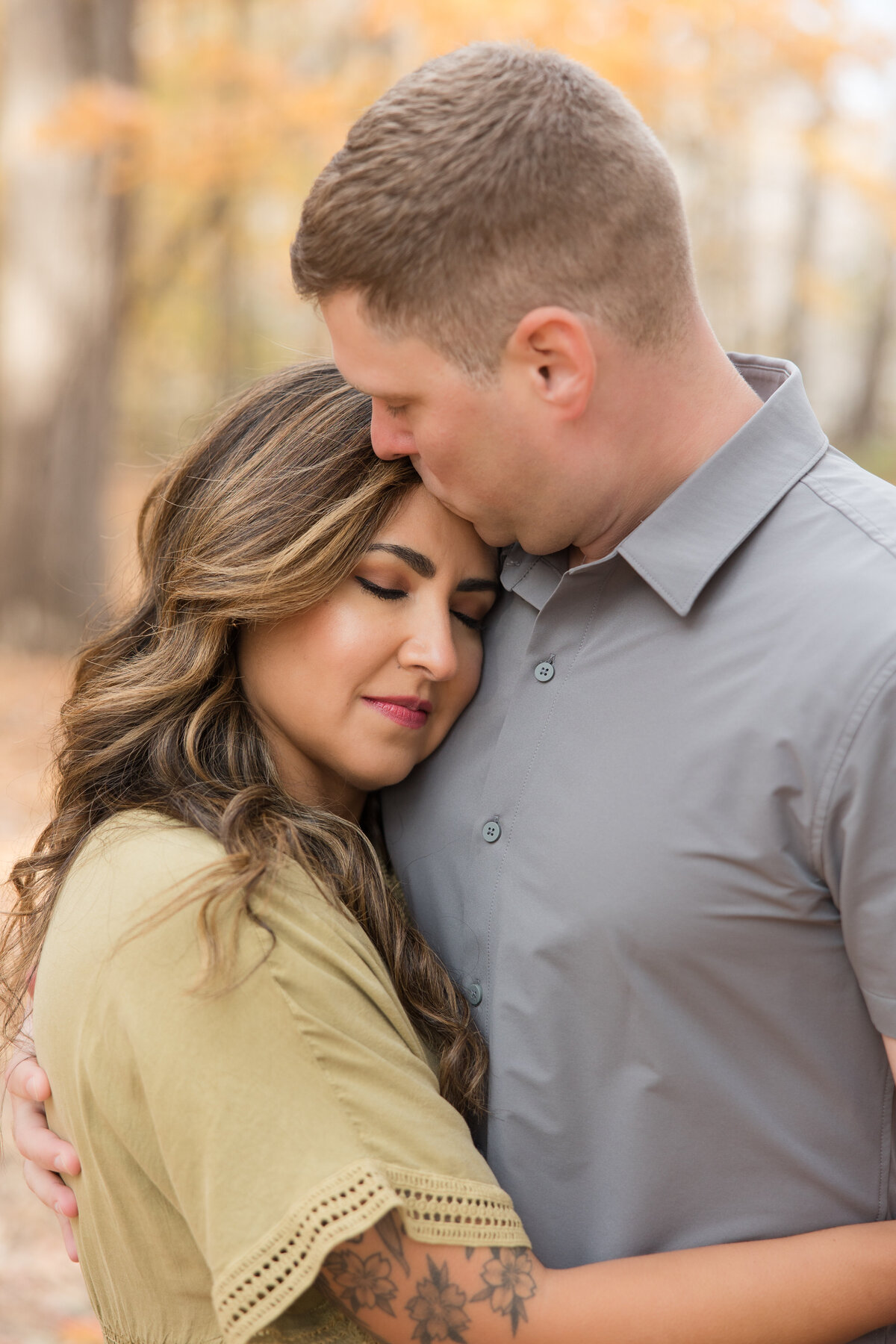 Married couple holding each other sweetly