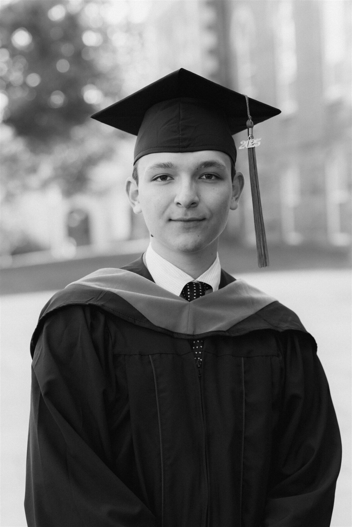 senior graduate cap and gown portrait on campus