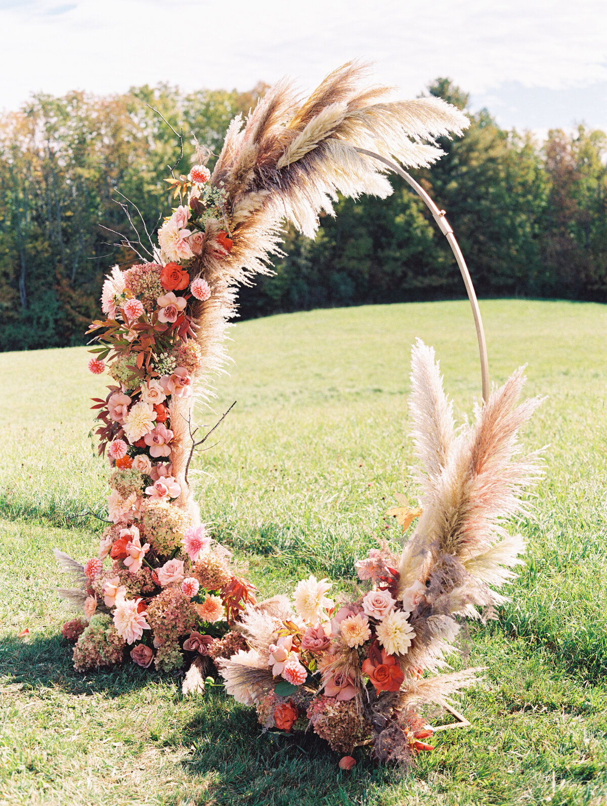 Pampas grass and flower ceremony arch