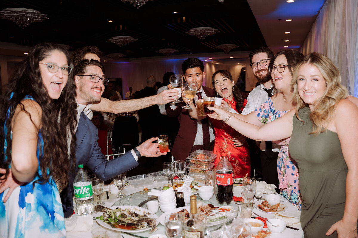 wedding guests celebrating at reception, destination wedding