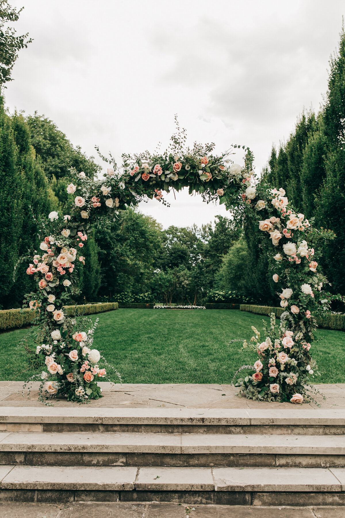 Luxurious wedding rose arch