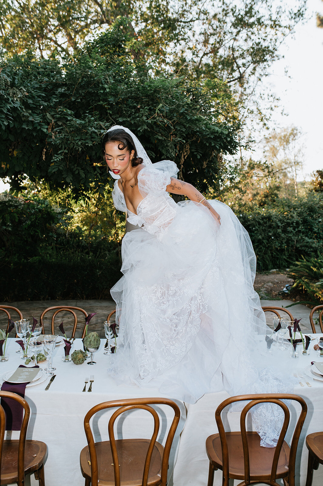 Bride-standing-on-table