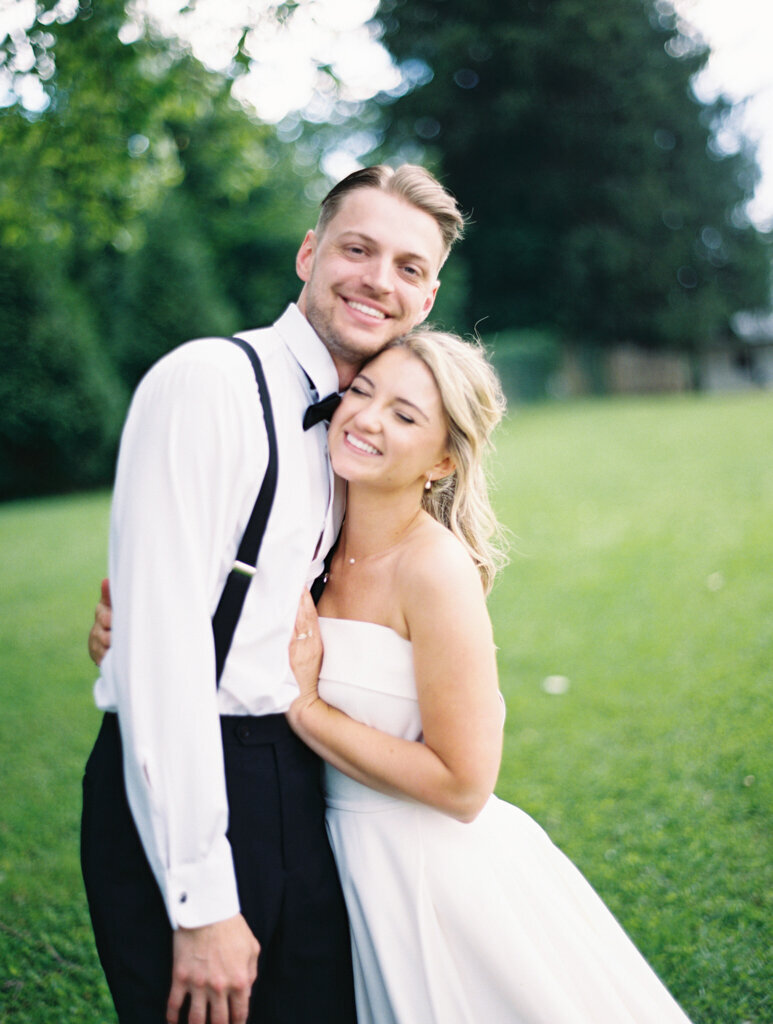 couple embracing taken by one of the top washington dc wedding photographer Nicole Simensky