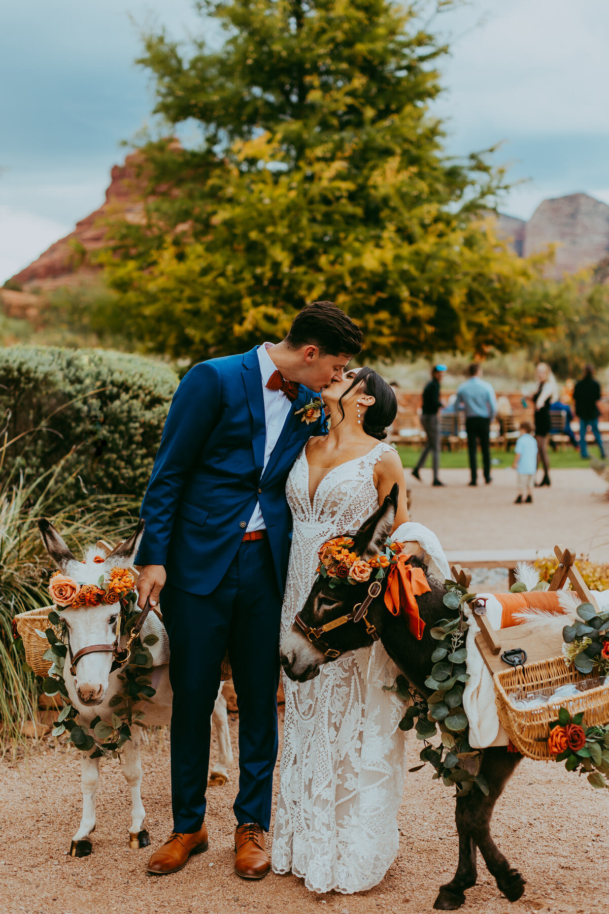 couple kisses with beer burros in sedona