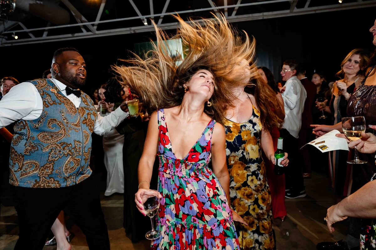 Wedding guest flips her hair on dance floor