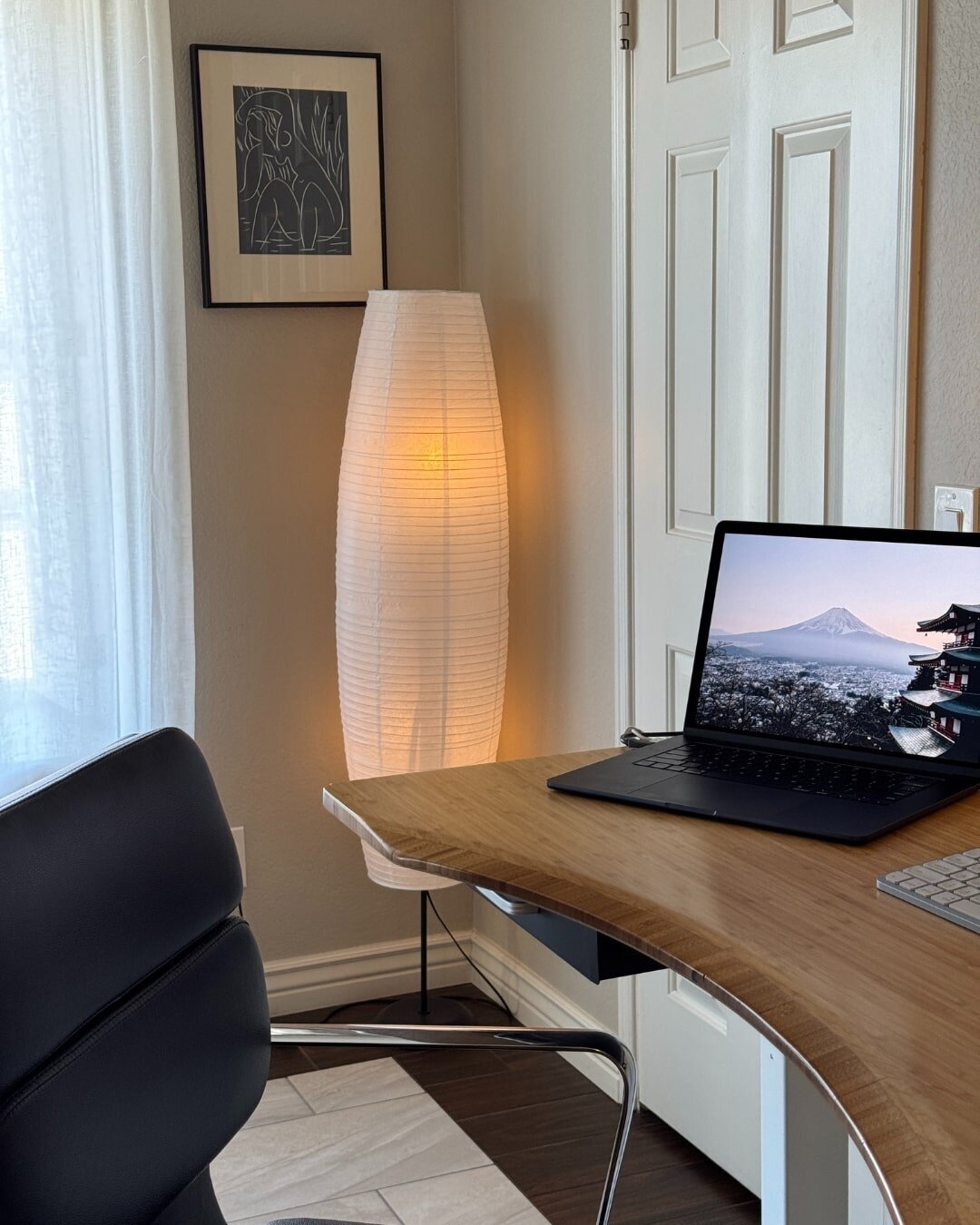 aesthetic desk setup with a lantern and laptop for a content creator