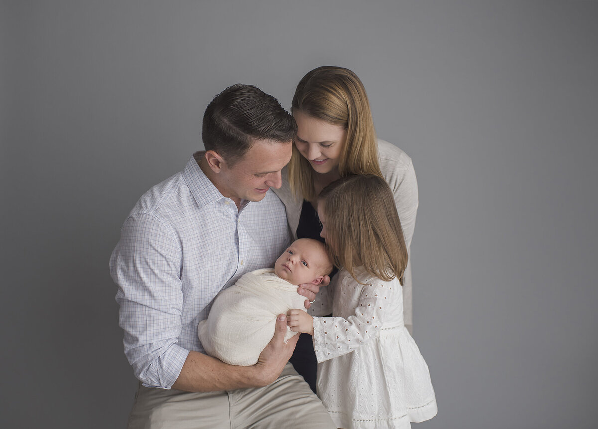 family session indoor studio with grey setting