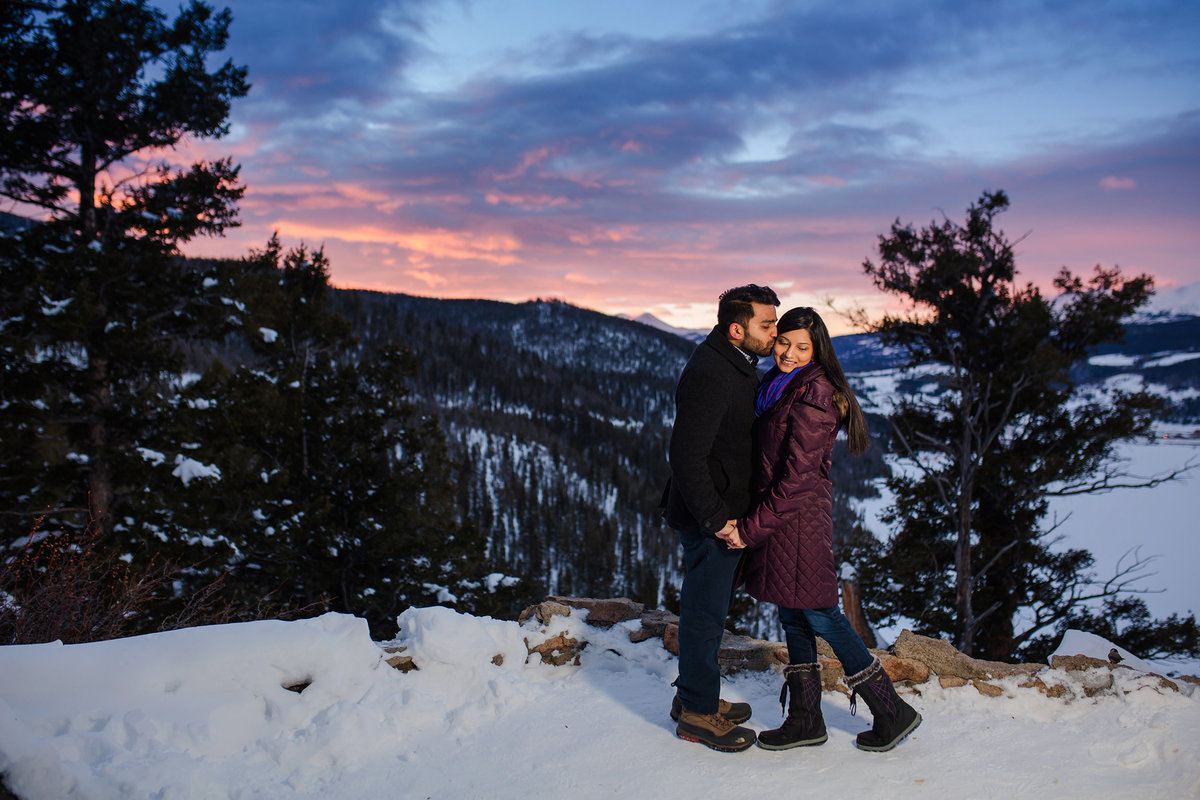 engaged couple at snowy Sapphire Point