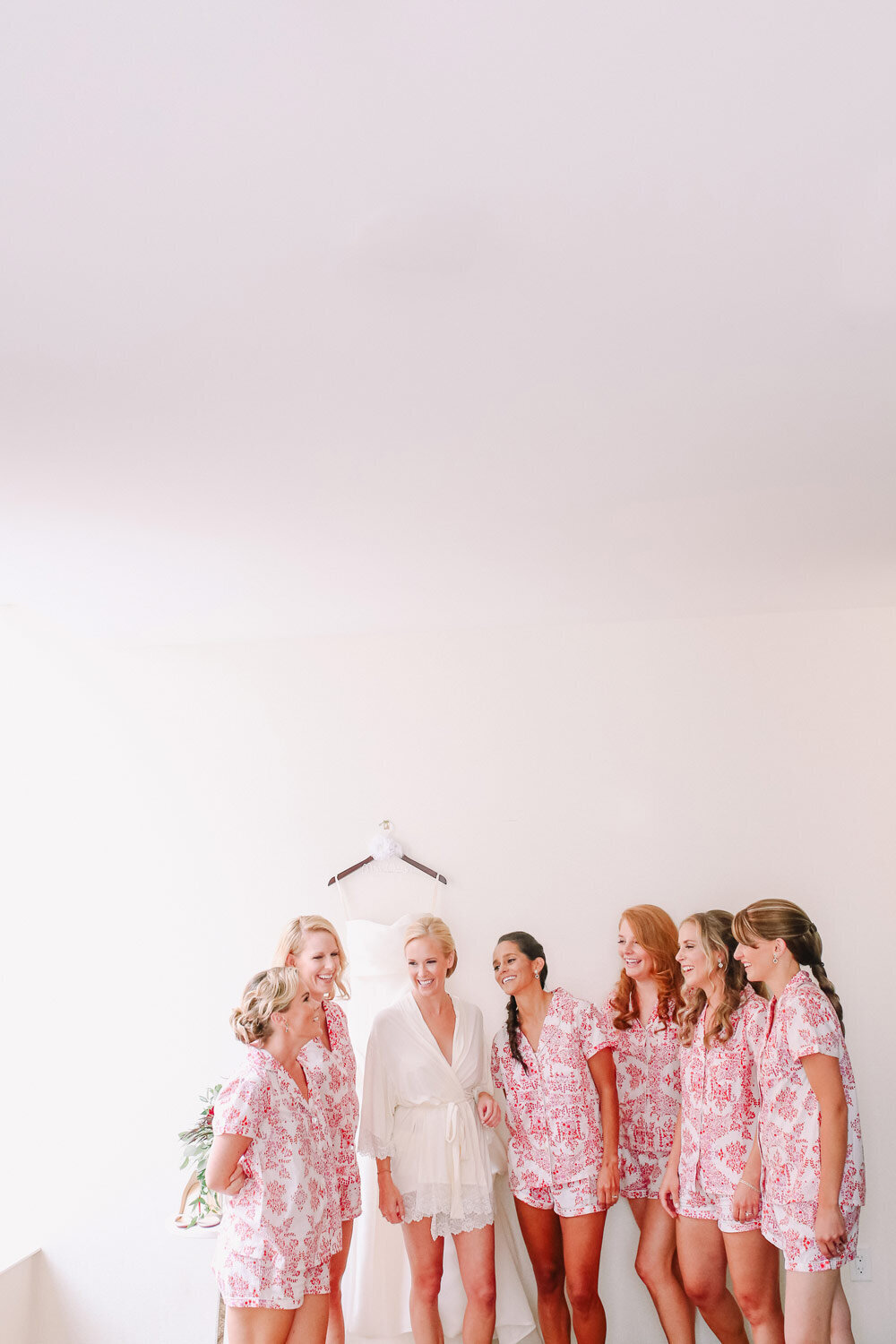 Bride and bridal party getting ready before a black tie wedding