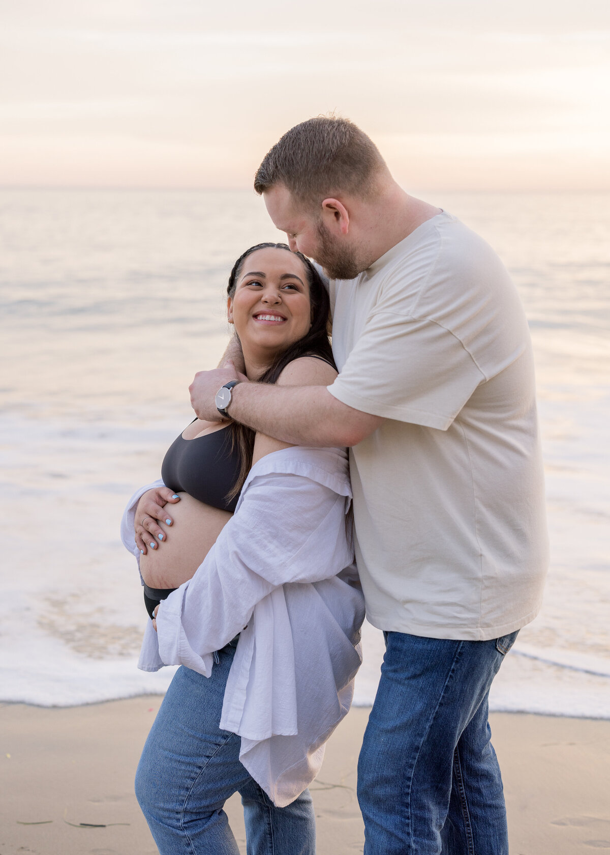 romantic maternity photo on the beach