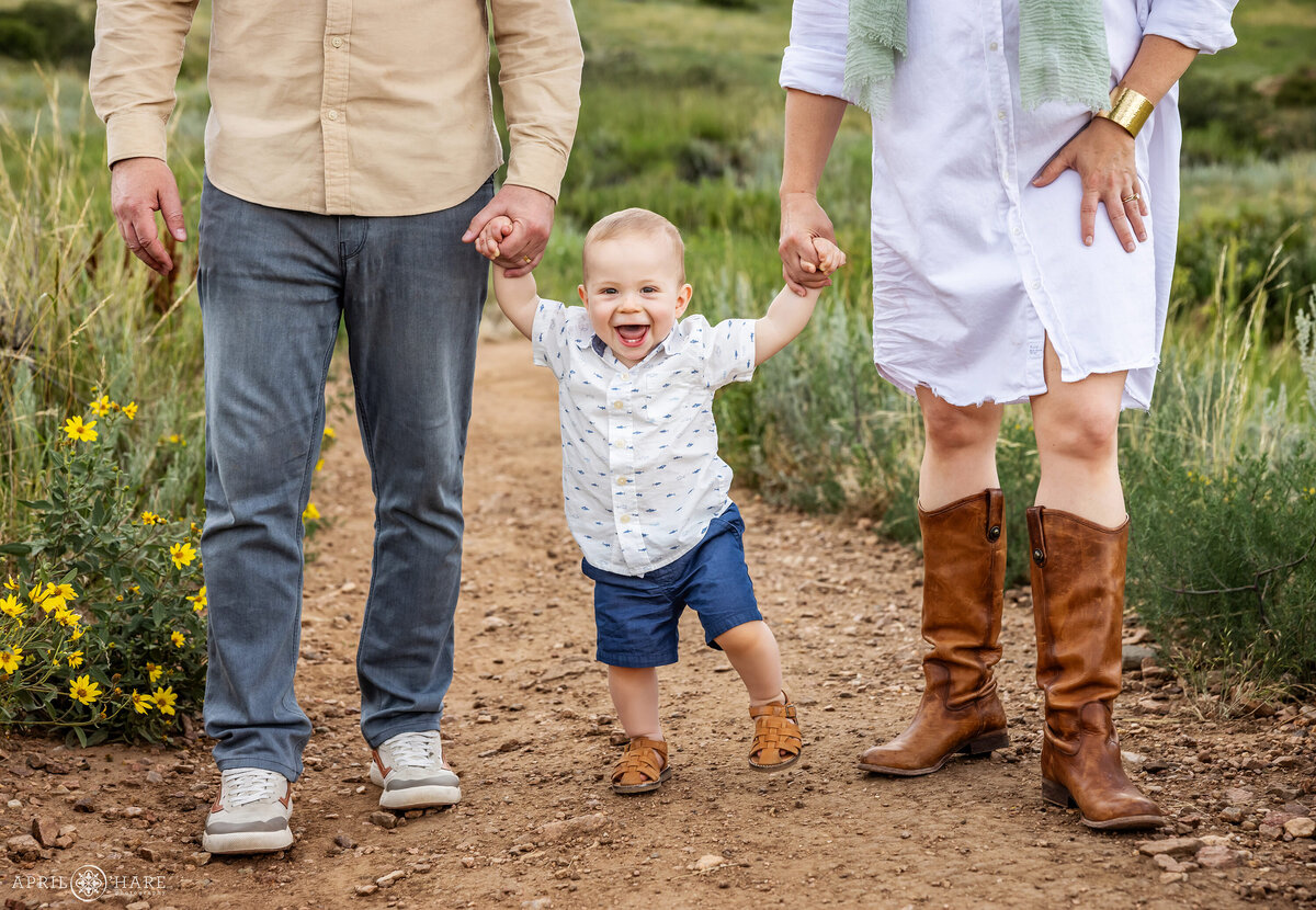 Adorable Baby Boy Walks with his Parents at Denver Family Photoshoot