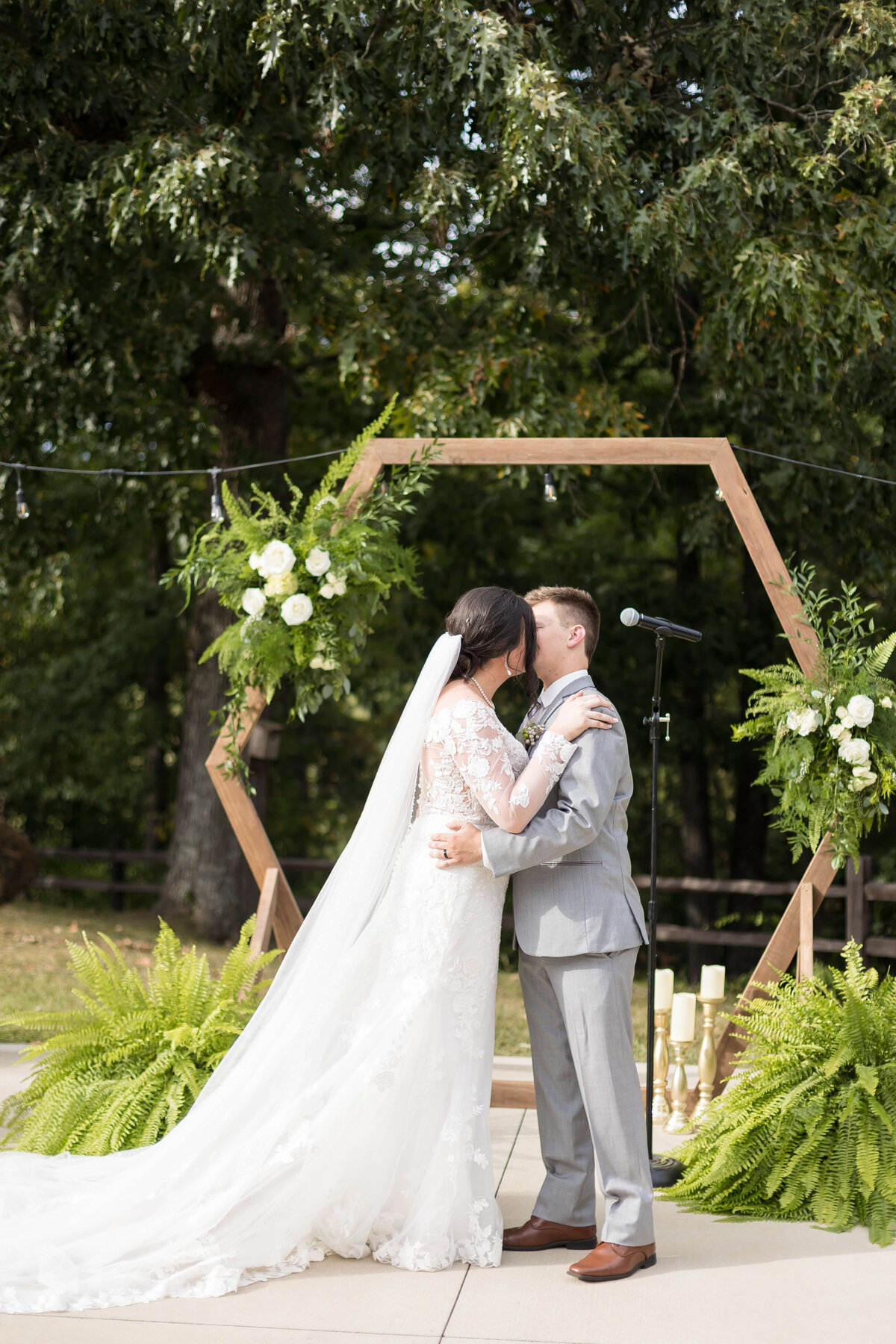 Bride and groom kissing at at wedding at Mahr Park Arboretum, Tennessee