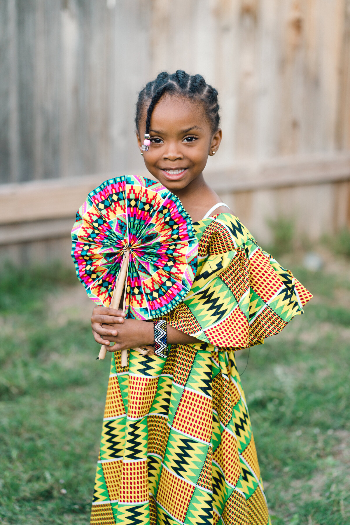 Austin Texas Family photo of young African child in traditional African dress.