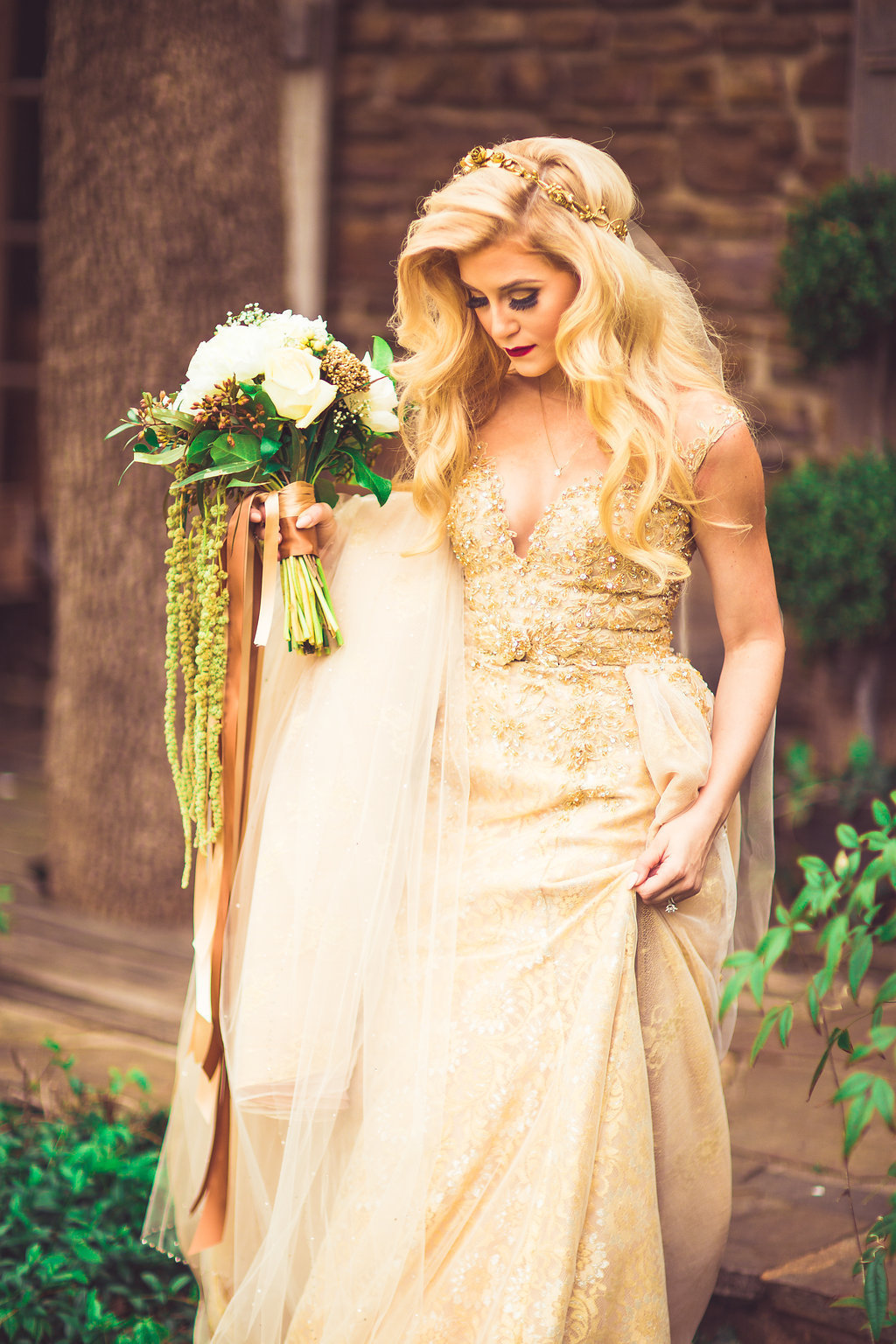 Wedding Photograph Of Bride Holding Her Bouquet and Dress Los Angeles