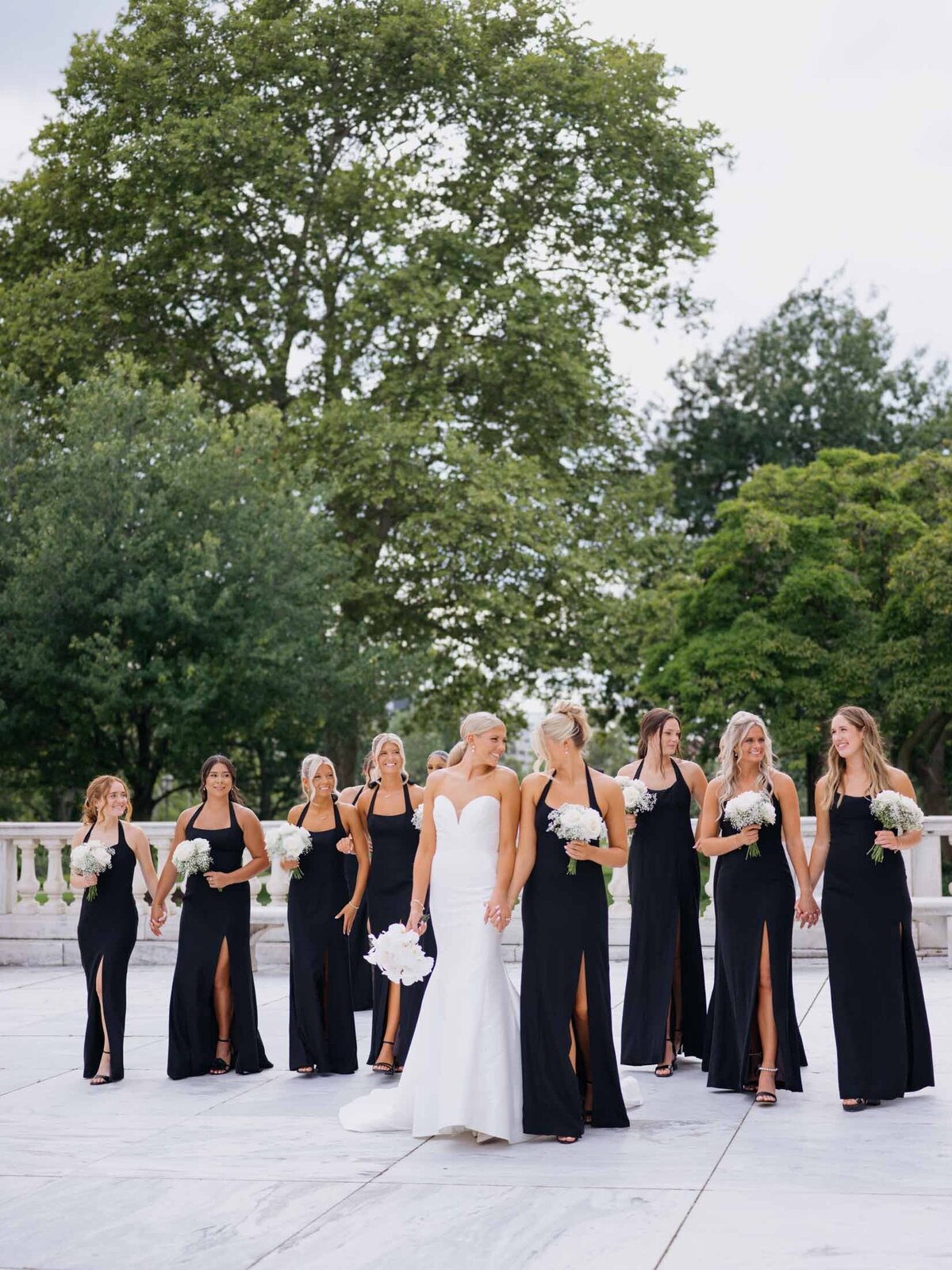 Bride with bridesmaids in black and white at Cleveland Art Museum