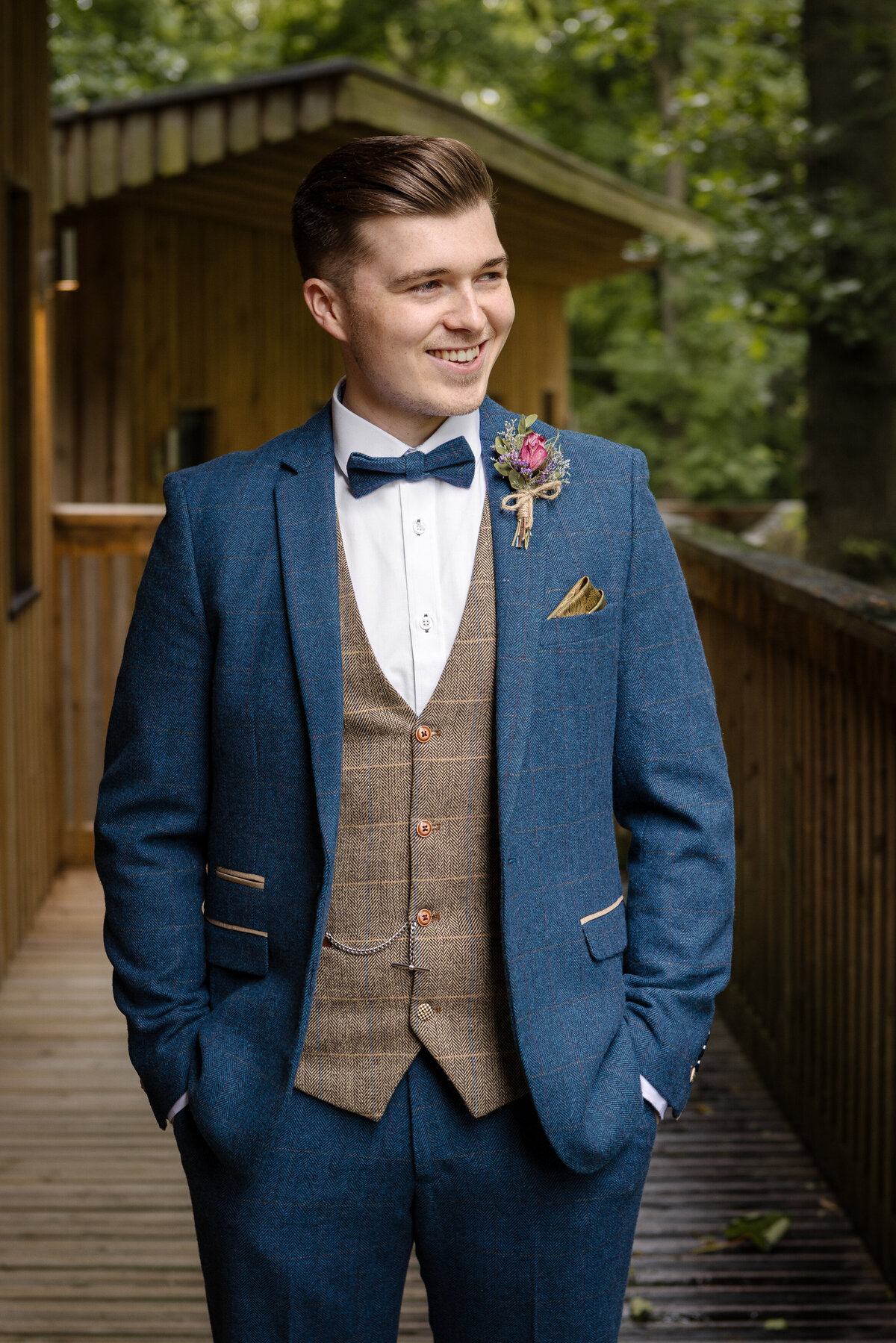 A groom in a blue suit