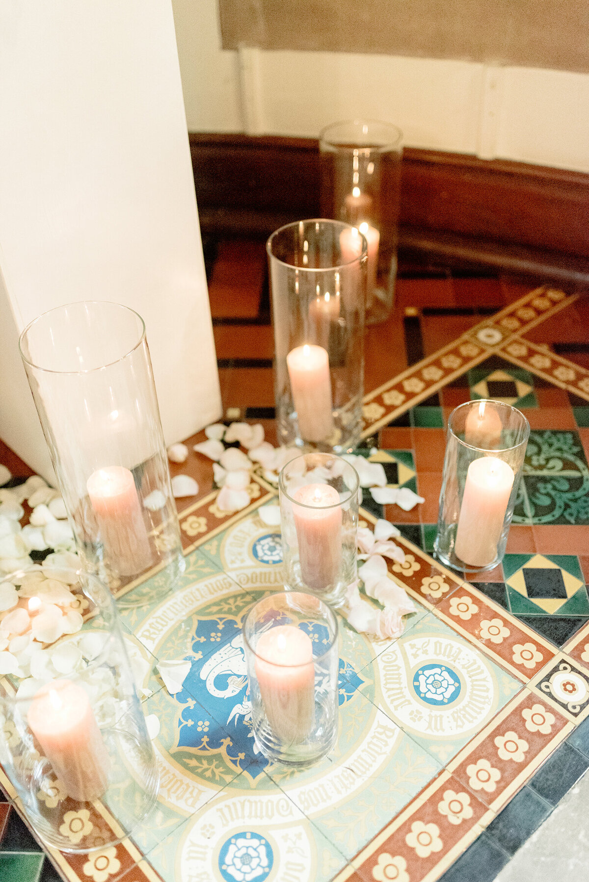 Cromlix House Chapel interior floor with ceremony pillar candles in soft pink.