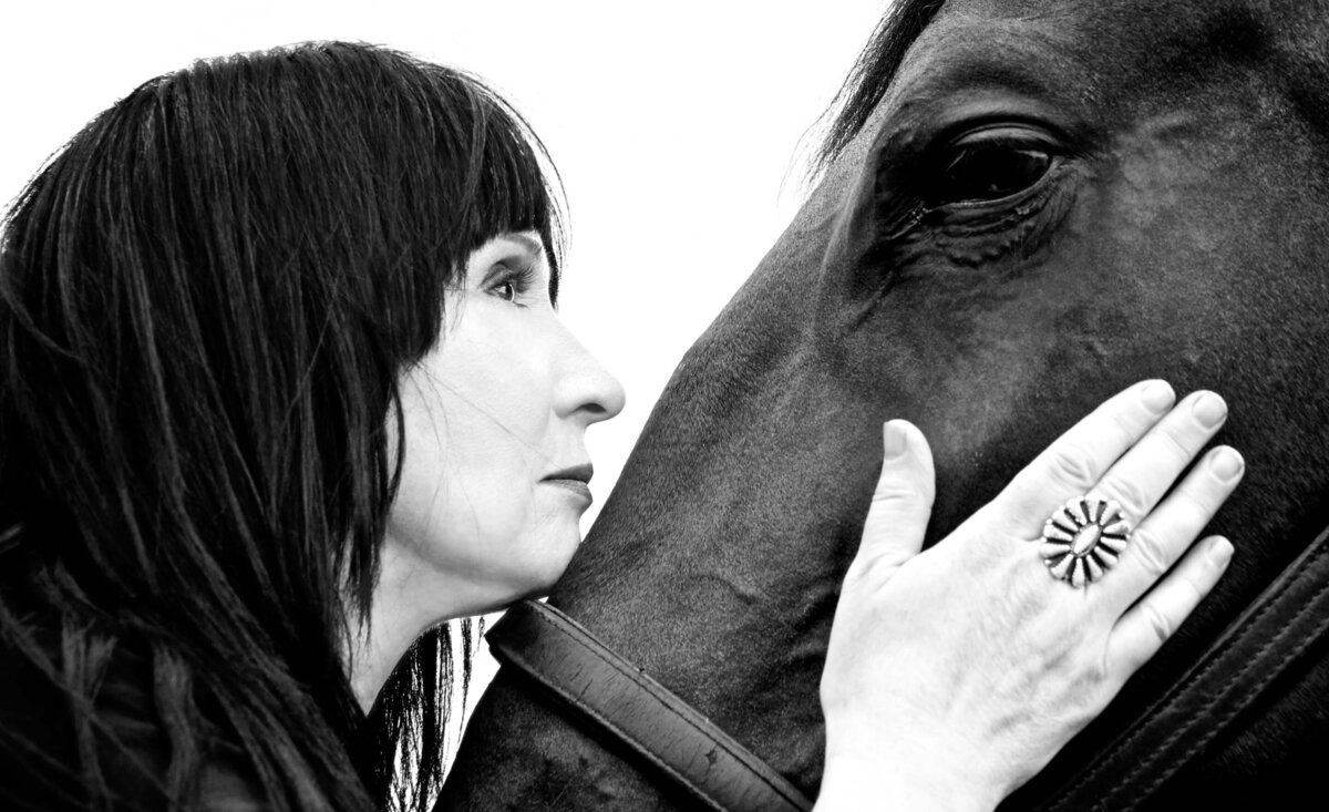 Country music photo  Valerie Sherman black and white holding horse head resting chin upon  head
