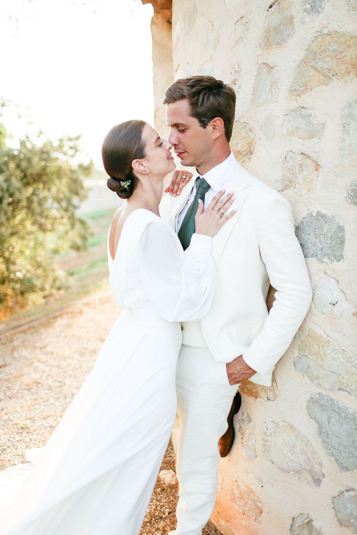 bride-and-groom-embrace-at-luxury-wedding-in-avignon