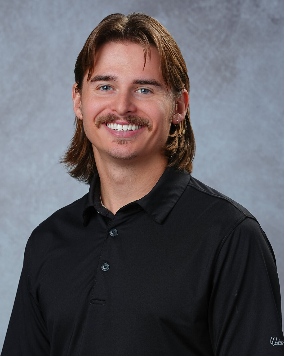 kansas-city-headshot_backdrop-standard-photography-0108-man-in-black-polo-shirt-headshot