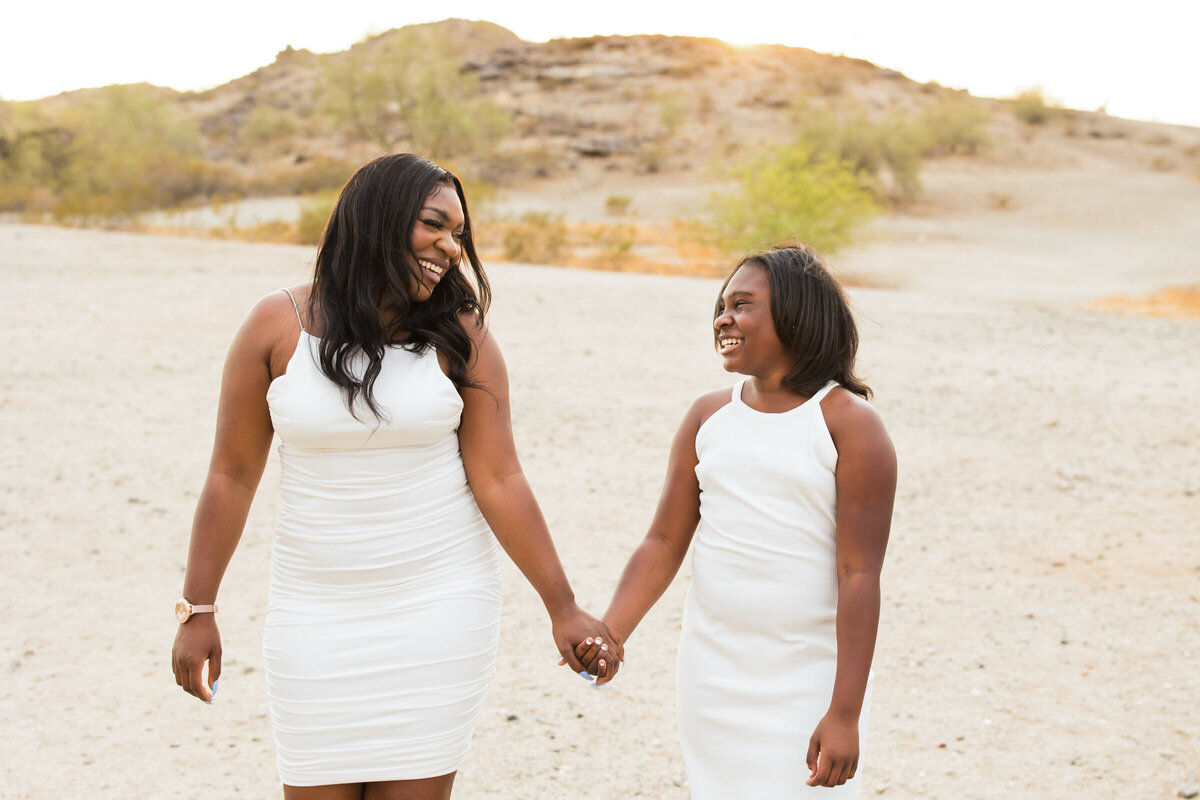 mom and daughter smiling together in Scottsdale desert