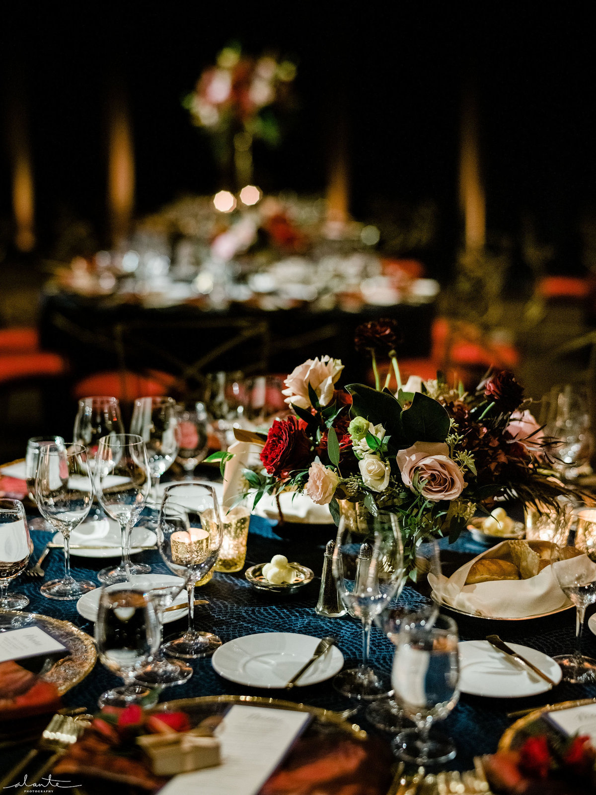 winter wedding reception details in red and blue