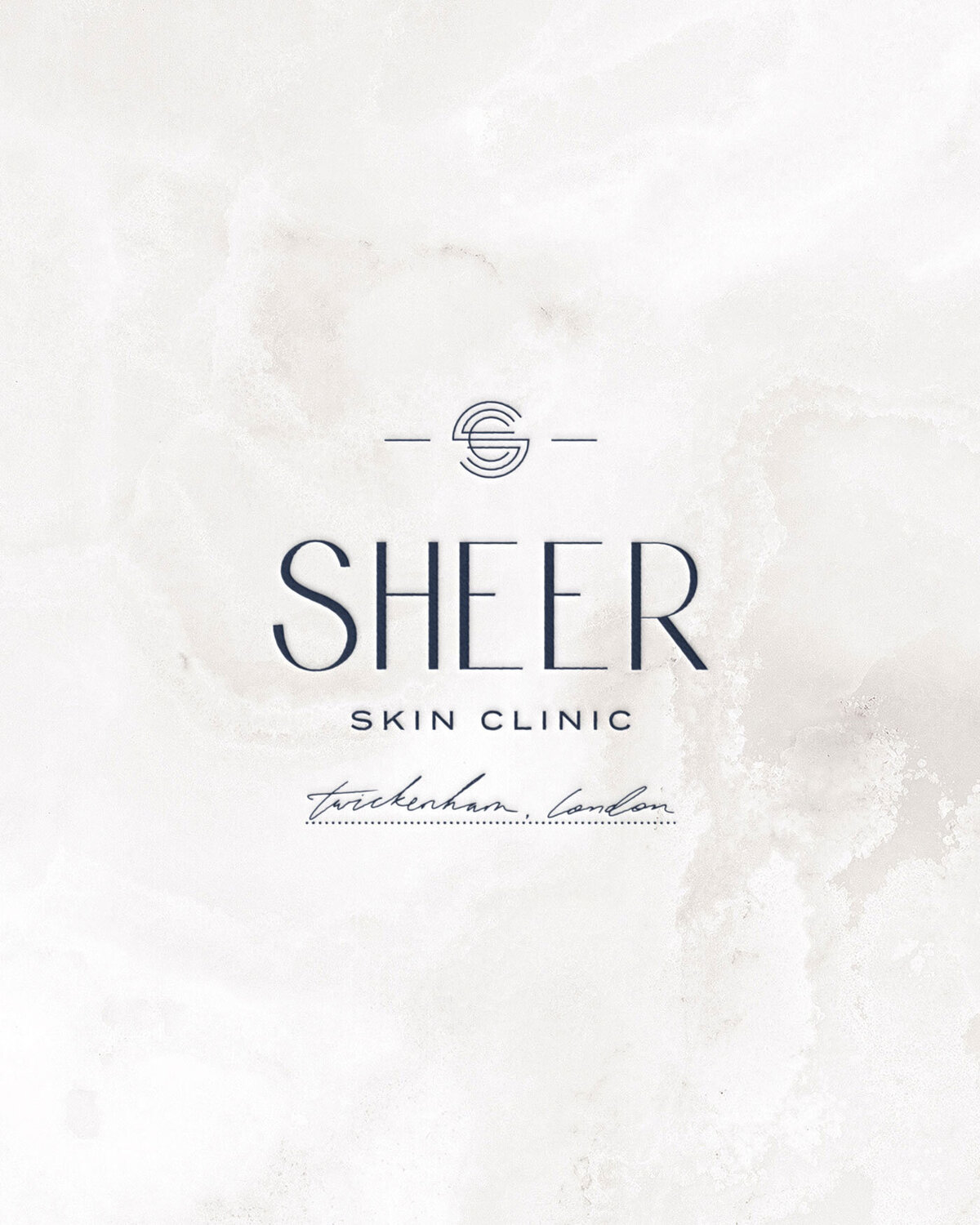 Premium brand identity for a skincare clinic, featuring a navy and cream colour palette.