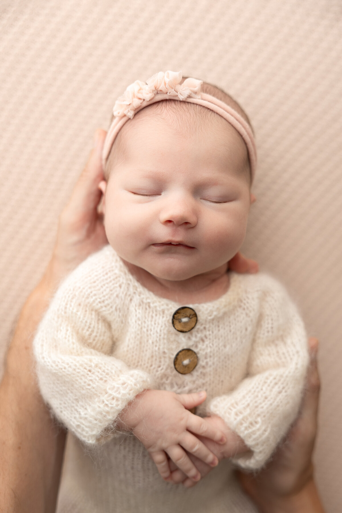 Newborn baby girl in pink Edmonton studio photography 