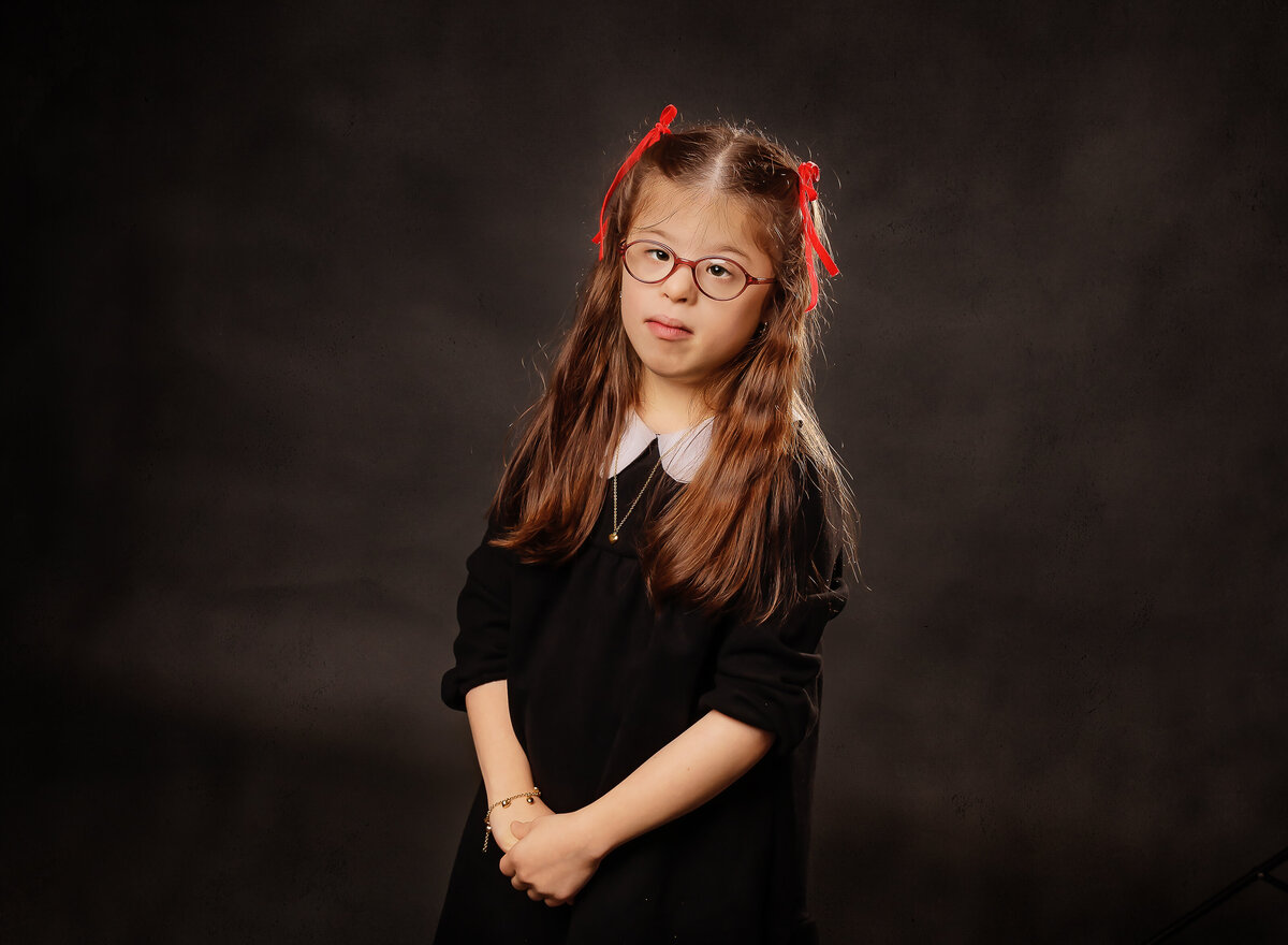 Young girl is captured for a studio portrait in brooklyn ny.  Captured by Brooklyn family photographer Chaya Bornstein