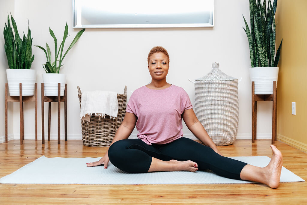 Michelle stretching during a yoga session
