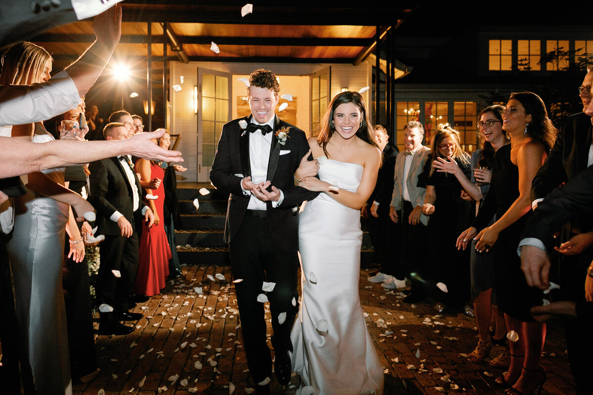 bride and groom flower petal toss reception exit mattie's wedding venue austin