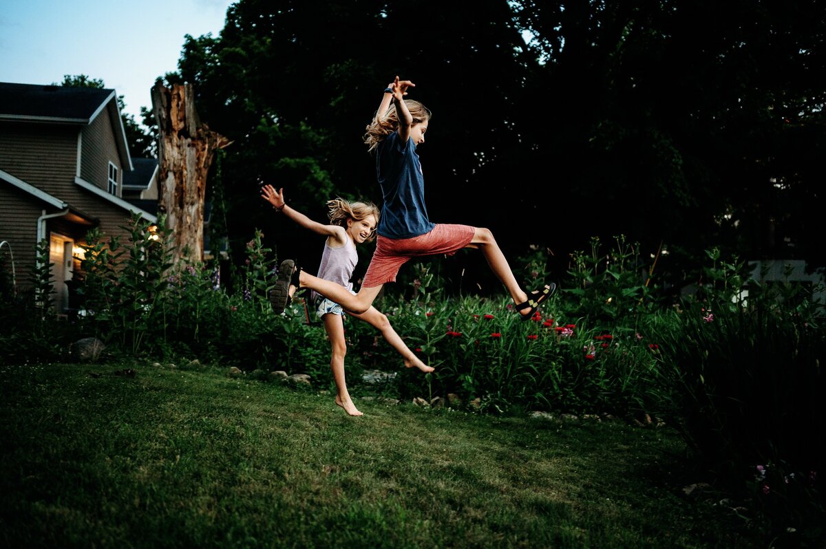 Children leaping summer McKennaPattersonPhotography
