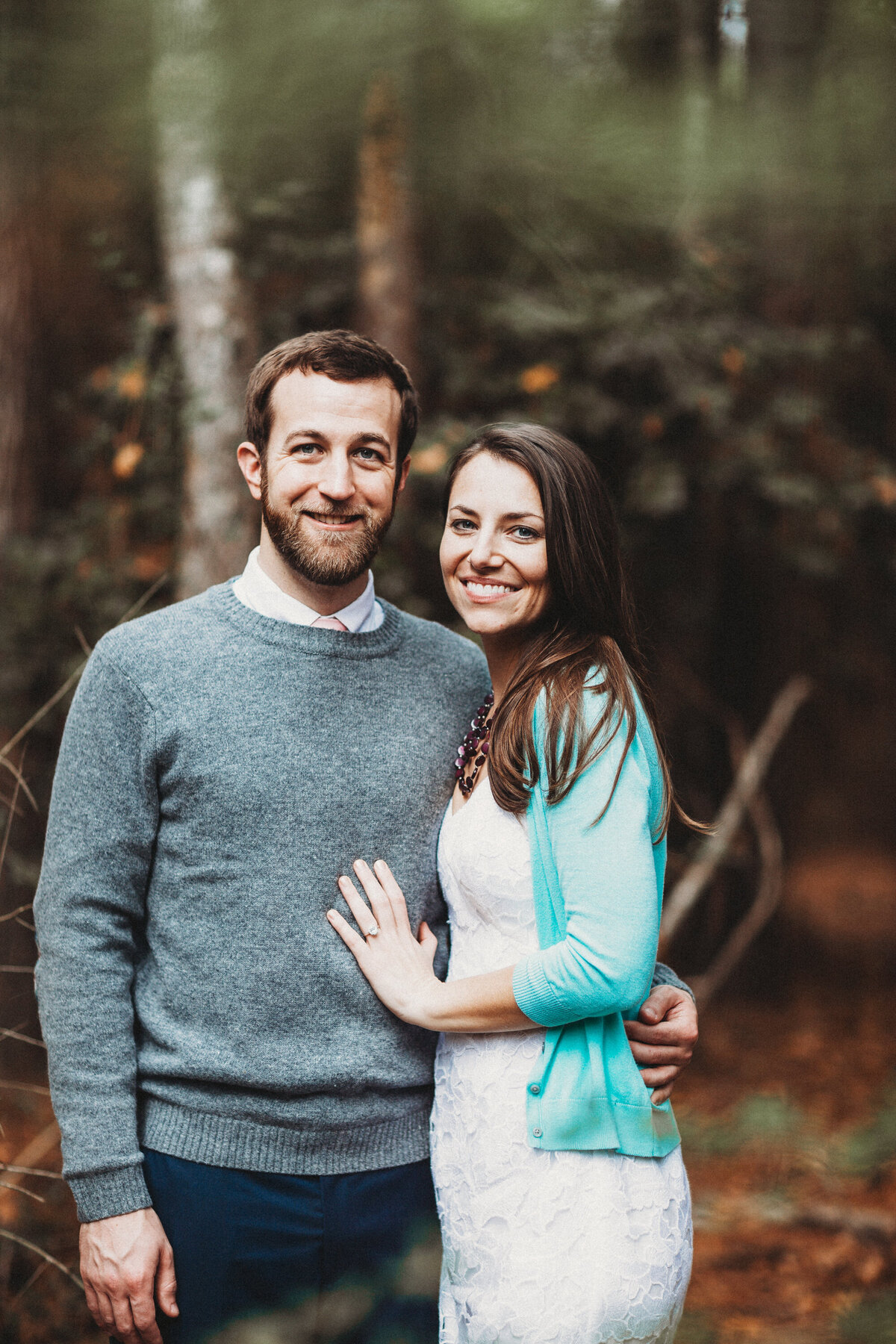 Romantic couples portrait in wooded forest setting in Winter Garden, Florida.