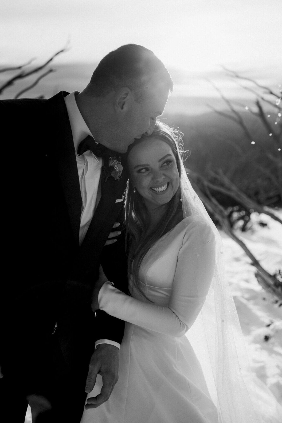 Bride_Leaning_On_Groom_Shoulder