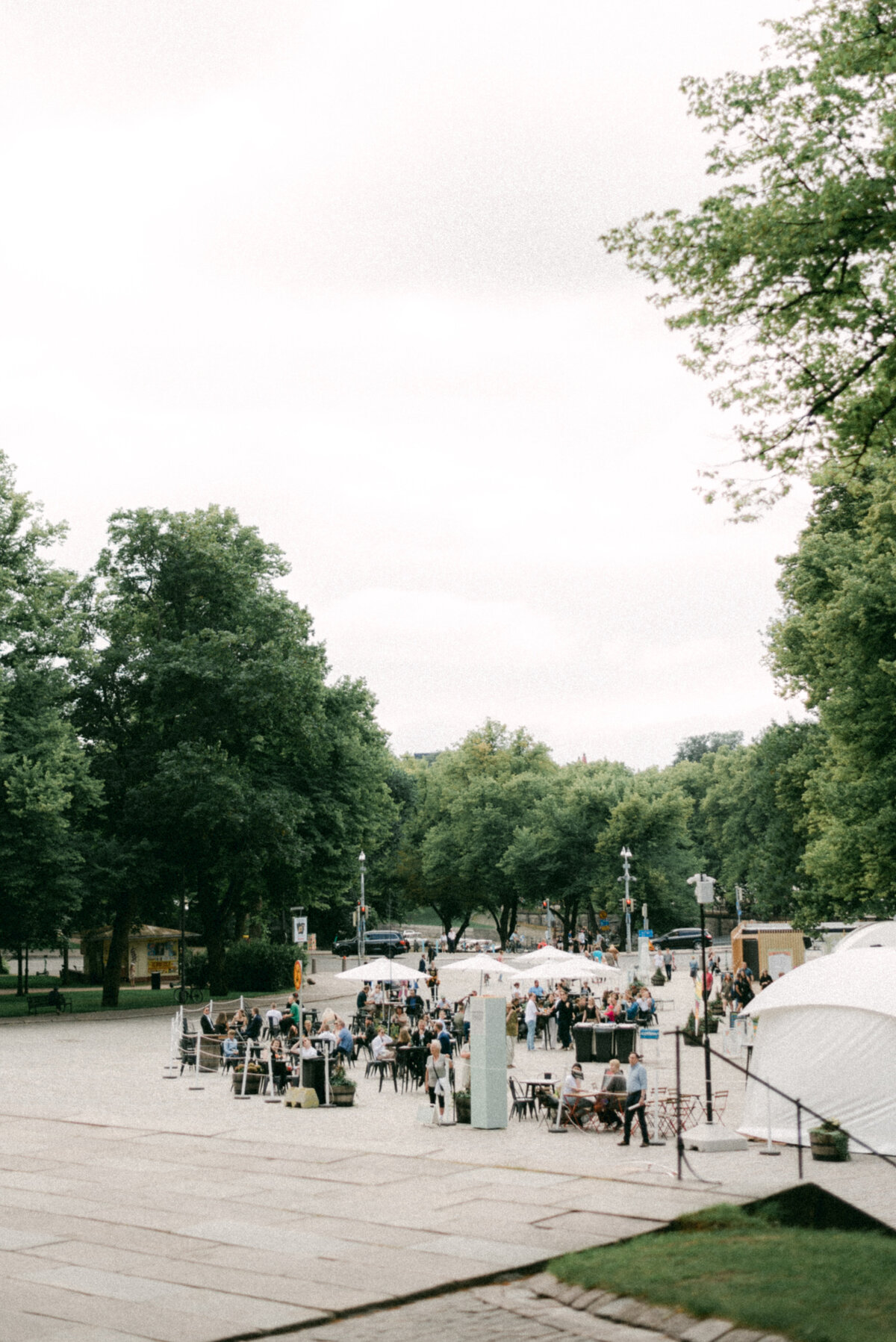 People on the terrace in front of Turku cahtedral in summer